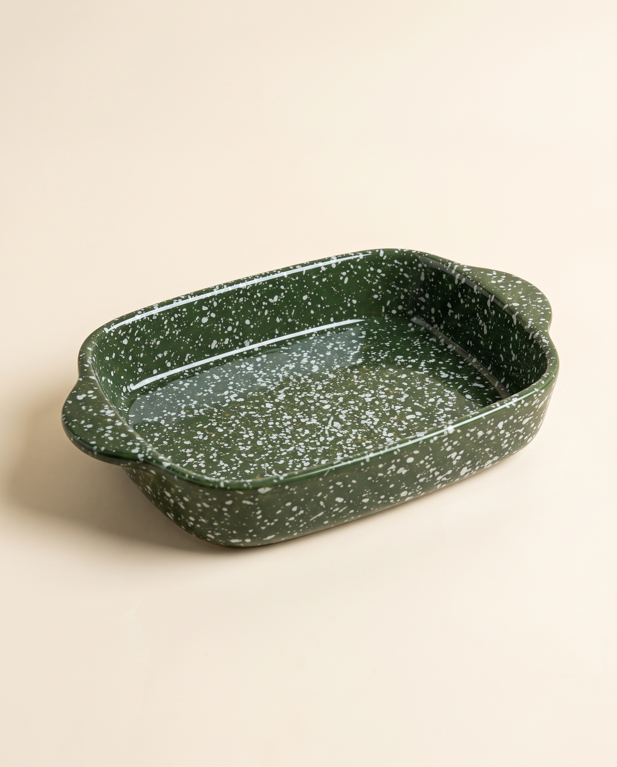 Splatterware ceramic baking dish in Forest Green glaze